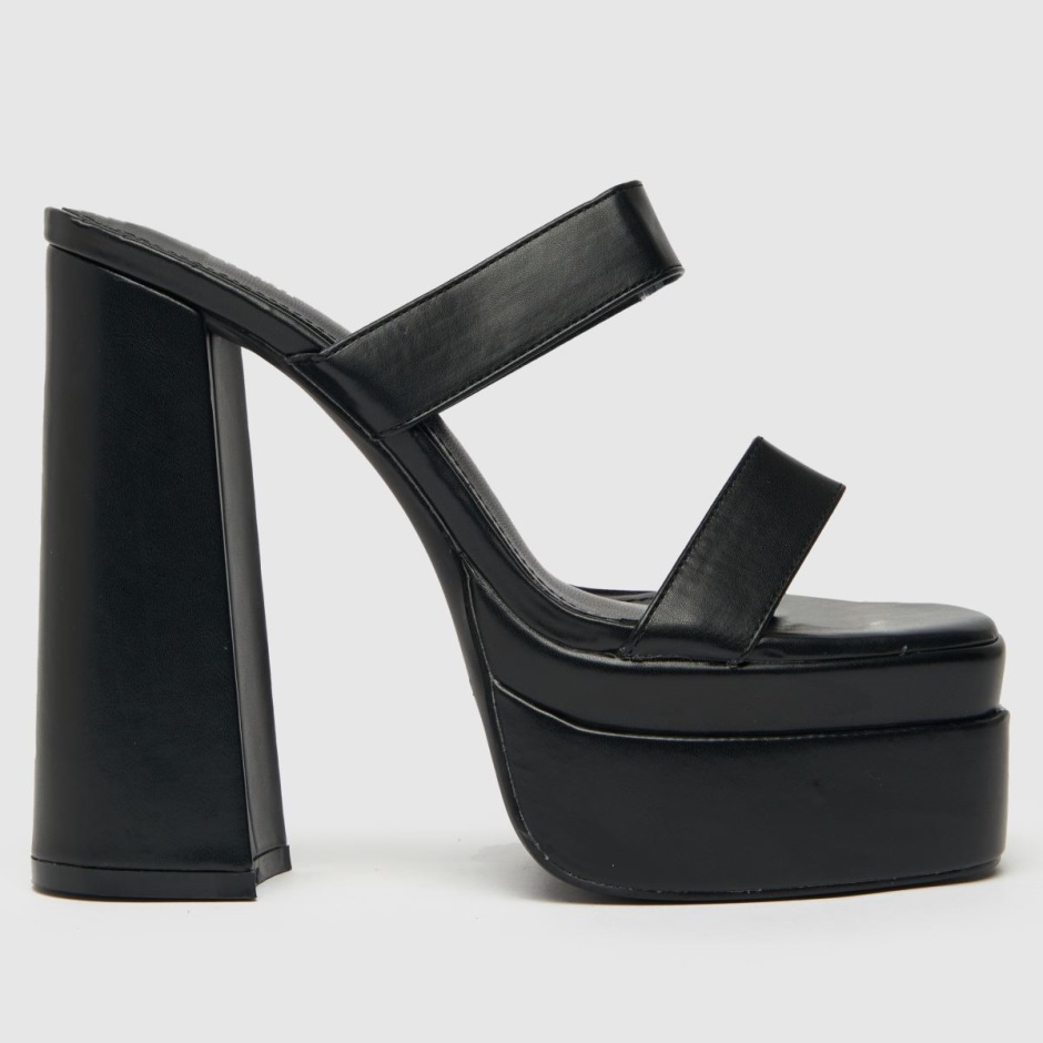 Schwarz Dr Martens Schweiz Simmi Robin Mule High Heels Gestapelt