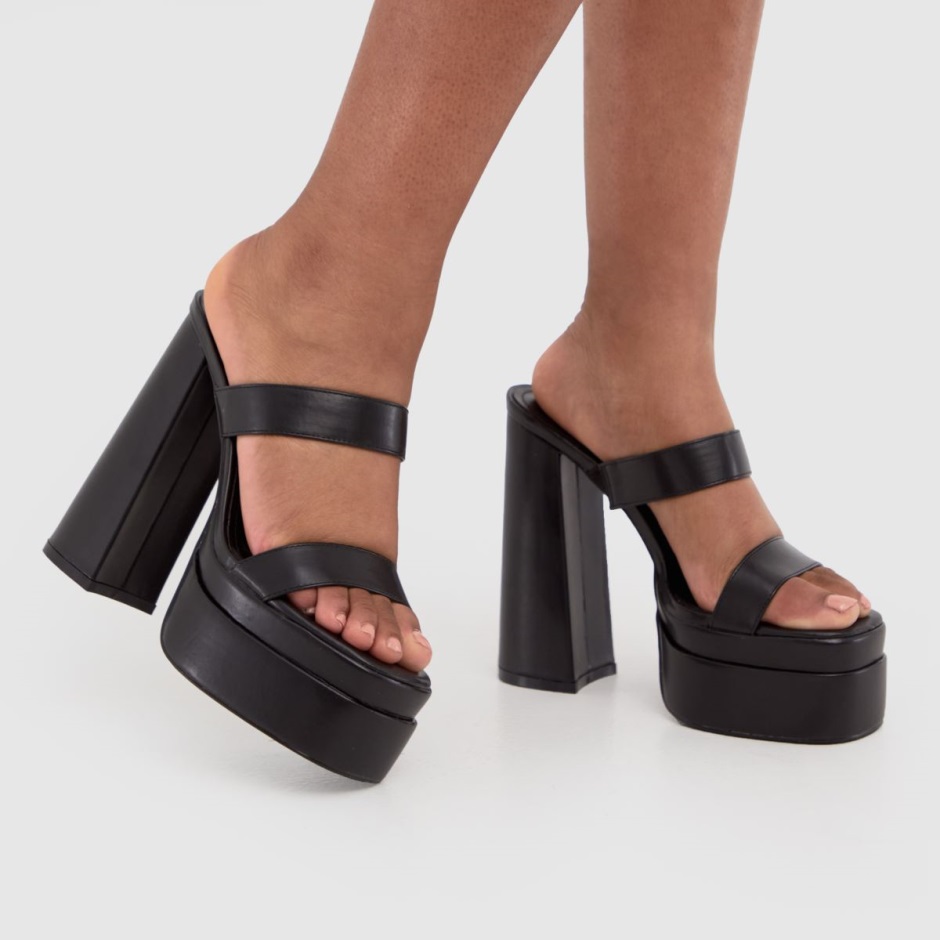 Schwarz Dr Martens Schweiz Simmi Robin Mule High Heels Gestapelt