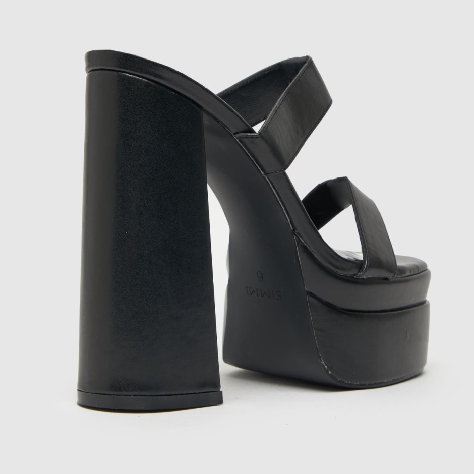 Schwarz Dr Martens Schweiz Simmi Robin Mule High Heels Gestapelt