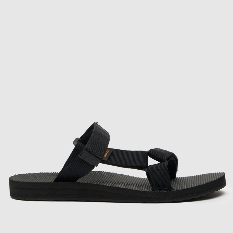 Schwarze Teva Universal Slide Vegane Sandalen Dr Martens Schweiz