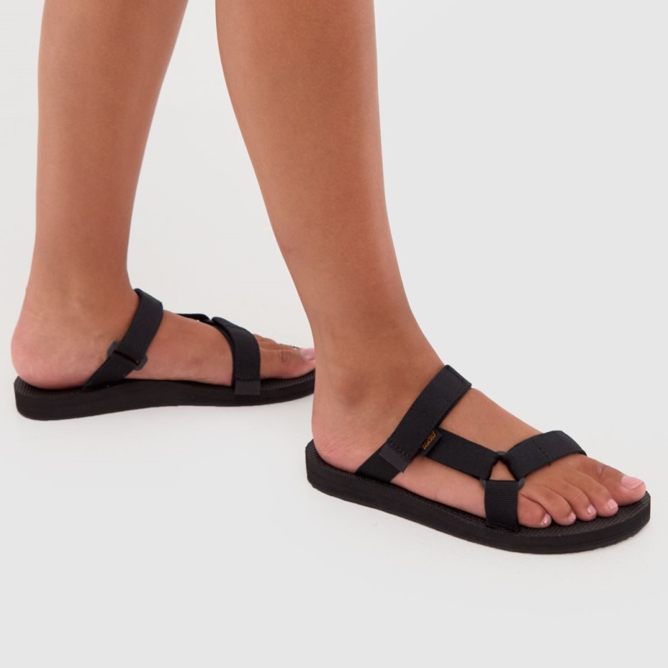 Schwarze Teva Universal Slide Vegane Sandalen Dr Martens Schweiz