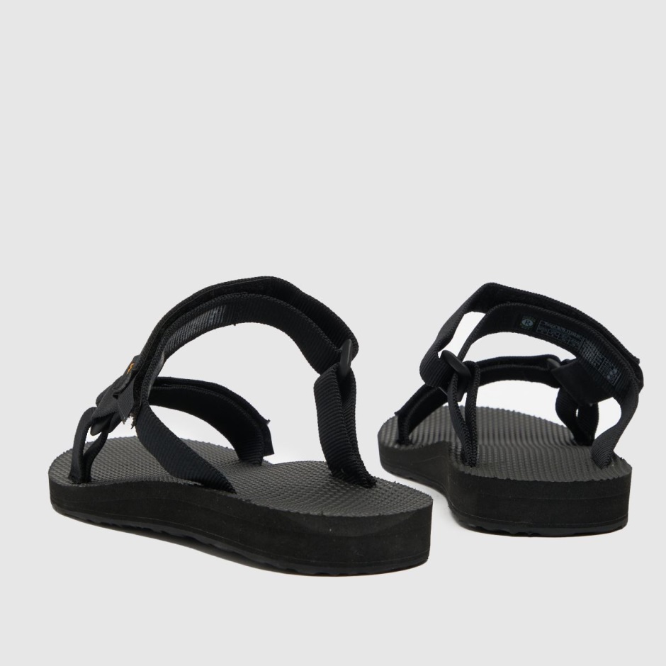 Schwarze Teva Universal Slide Vegane Sandalen Dr Martens Schweiz