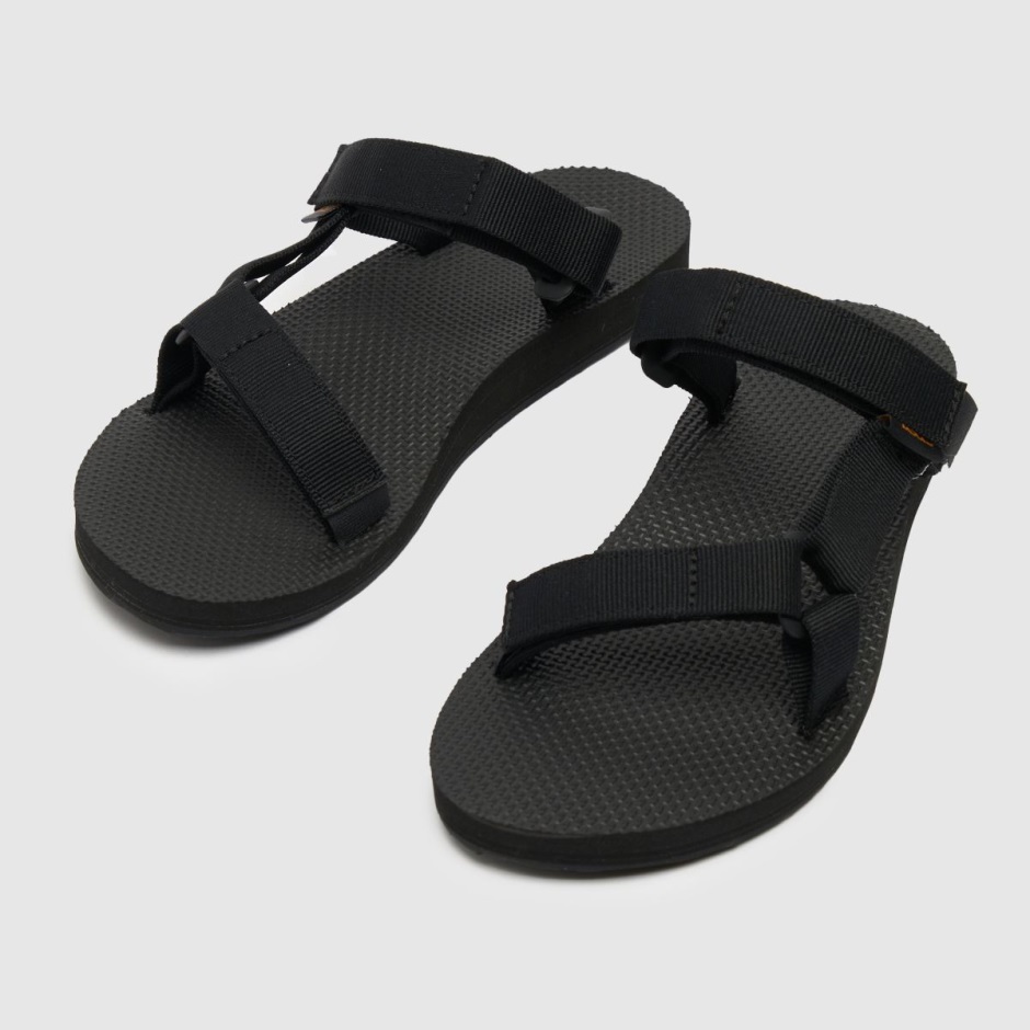 Schwarze Teva Universal Slide Vegane Sandalen Dr Martens Schweiz