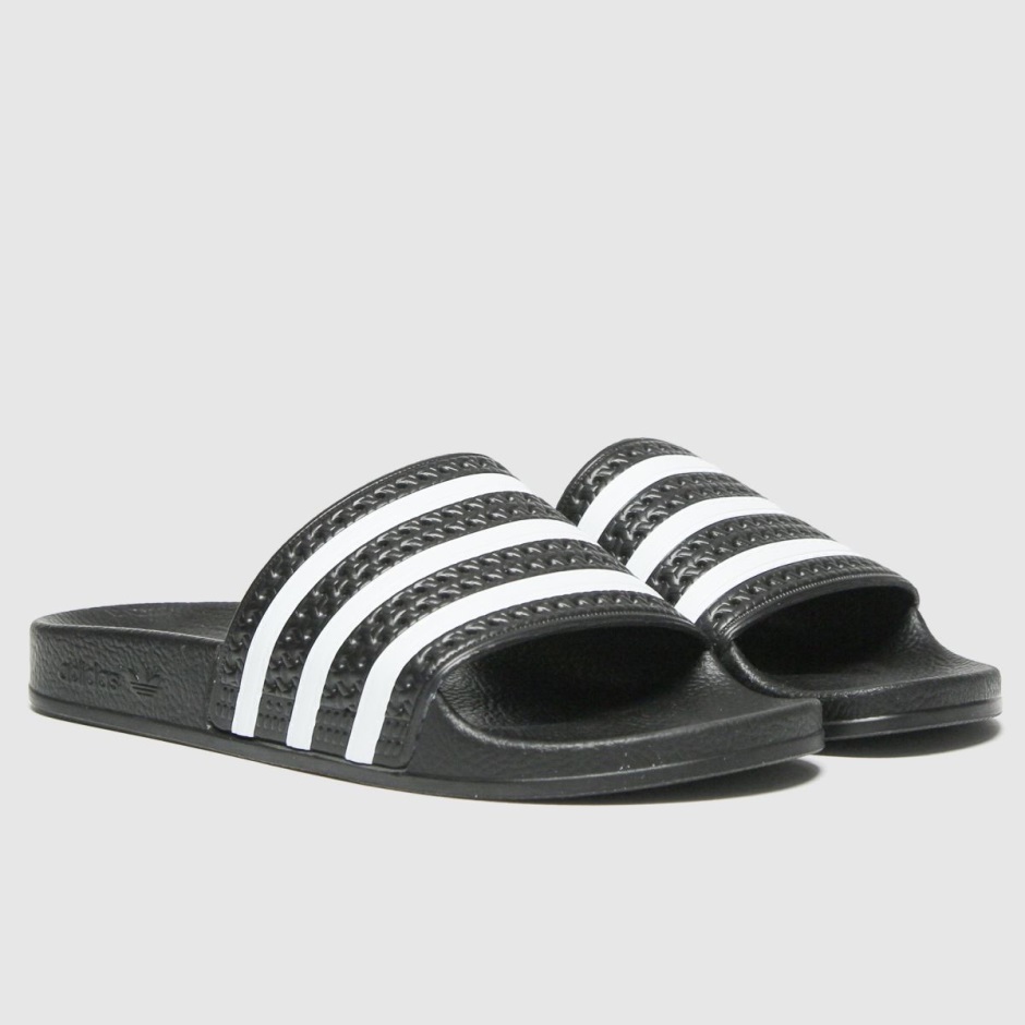 Black-white Dr Martens Schweiz Adidas Adilette Sandals