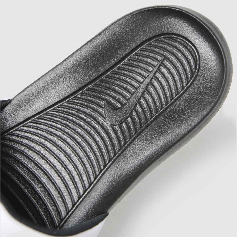 Weiß-schwarz Dr Martens Schweiz Nike Victori One Sandalen